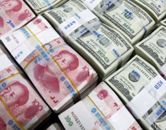 China bank chief says 'speculators' caused yuan fall